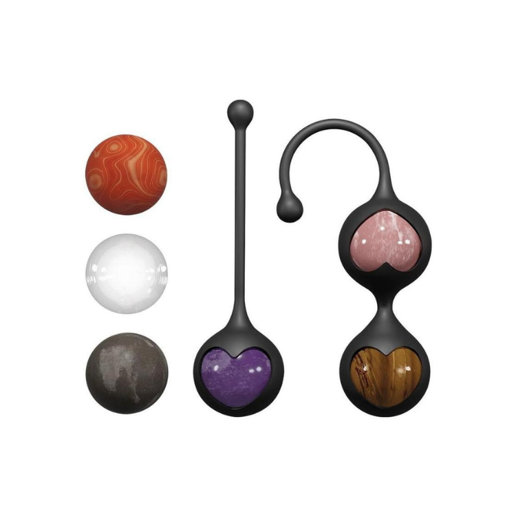 Set of black silicone kegel balls with colorful interchangeable stone inserts, heart-shaped design.