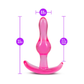 Pink silicone anal plug with curved base, measurements shown, pleasure toy product image.