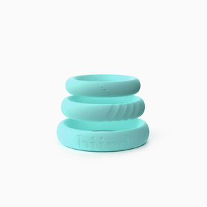 Mint silicone three-piece ring set by Biird, stacked, on white background at House of Vices