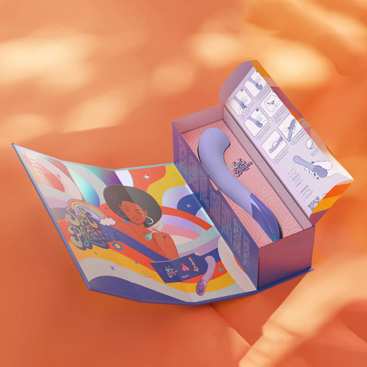 Biird Gii Glow lilac wellness massager in colorful box on orange surface, House of Vices premium wellness product.