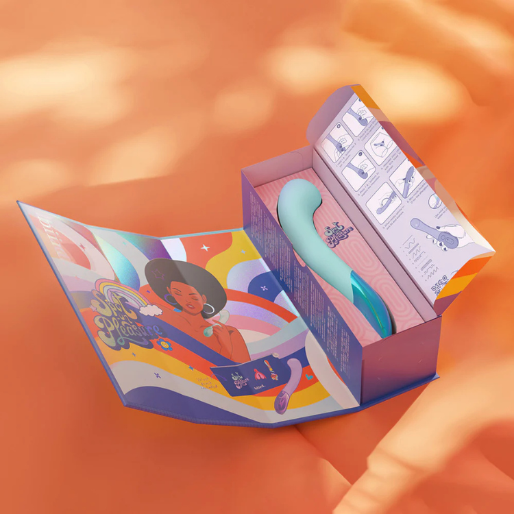 Biird Gii Glow mint wellness device in open colorful box on orange backdrop, House of Vices