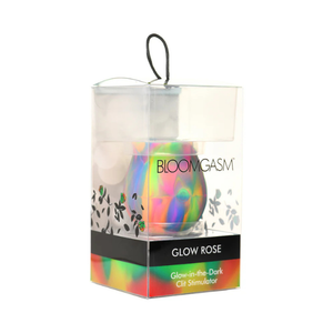 Glow-in-the-dark rose-shaped stimulator in holographic packaging with floral design