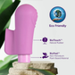 Purple eco-friendly bullet vibrator with sleeve on stone, labeled natural rubber and plant-based material.