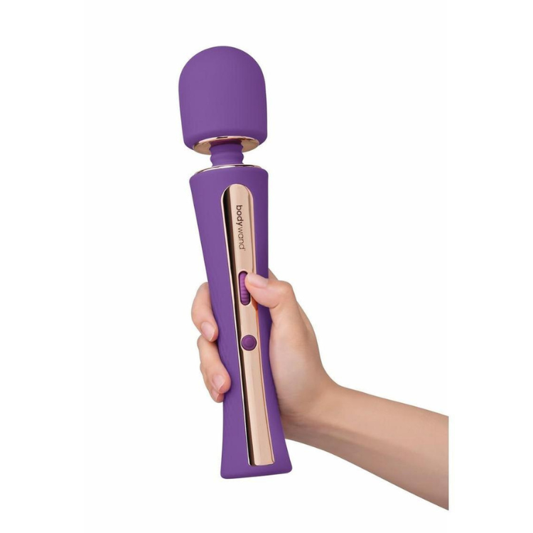 Purple Bodywand Luxe Couture rechargeable silicone wand massager held in hand
