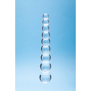 Clear glass beaded wellness toy with blue background at House of Vices