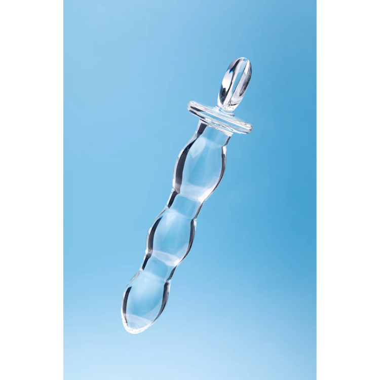 Clear glass beaded massage wand with handle against light blue background, House of Vices wellness product