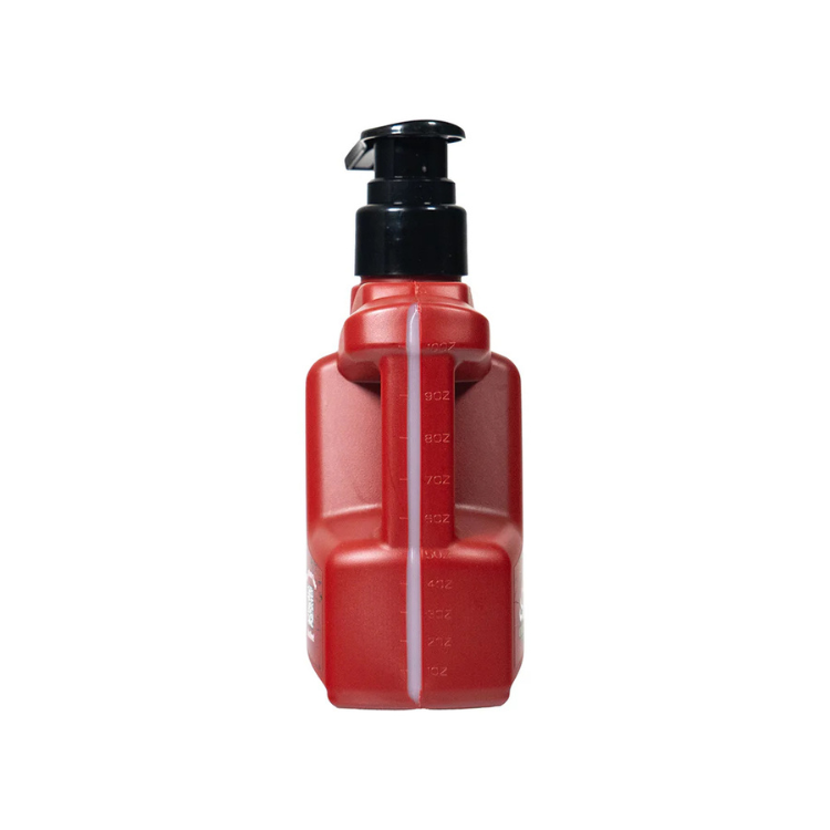 Red plastic bottle with black pump top containing water-based lubricant, measurement markings on side