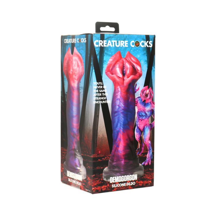 Demogorgon fantasy silicone toy in purple and pink, boxed with creature illustration on packaging