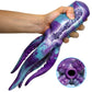 Hand holding a purple and blue silicone tentacle toy with textured details, close-up view