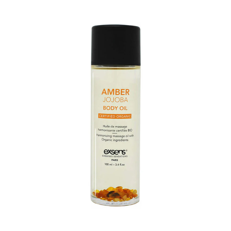 Exsens Amber Jojoba Body Oil 3.4 oz organic massage oil bottle with black cap and amber stones