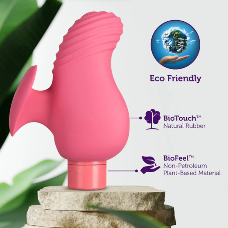 Eco-friendly pink bullet vibrator with textured sleeve, made from natural rubber and plant-based materials, displayed on stone with House of Vices branding.