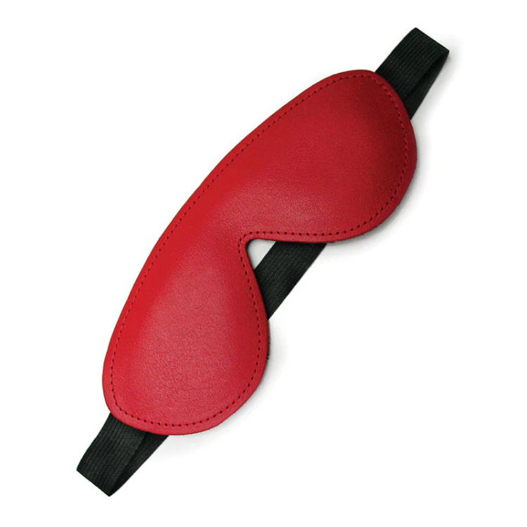 Red padded leather blindfold with black elastic strap on white background