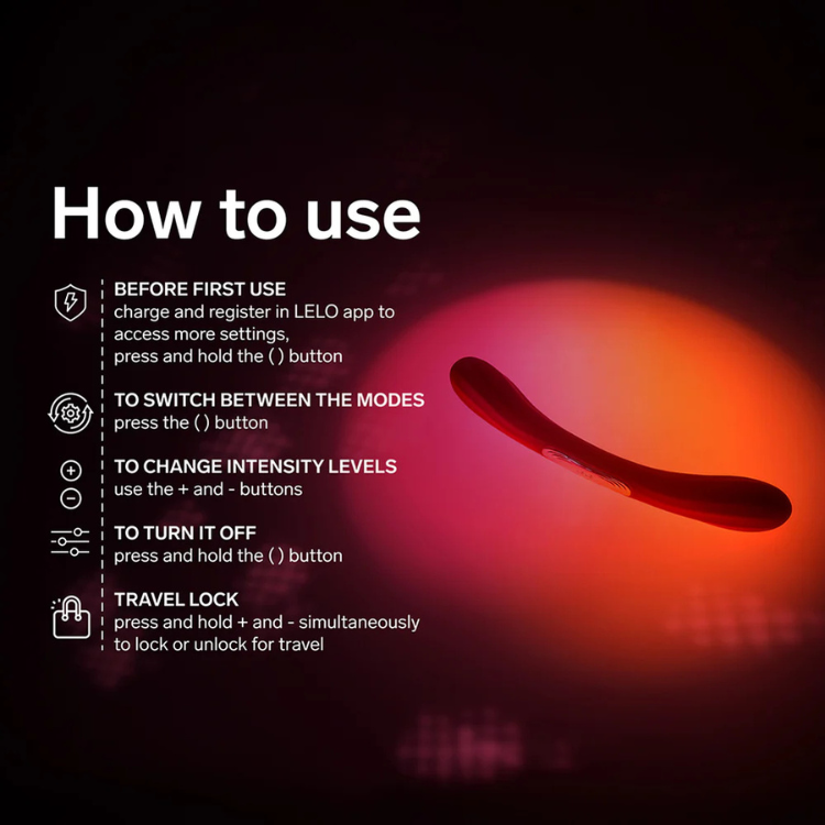 Curved silicone adult toy with backlit glow and usage instructions in a dark setting