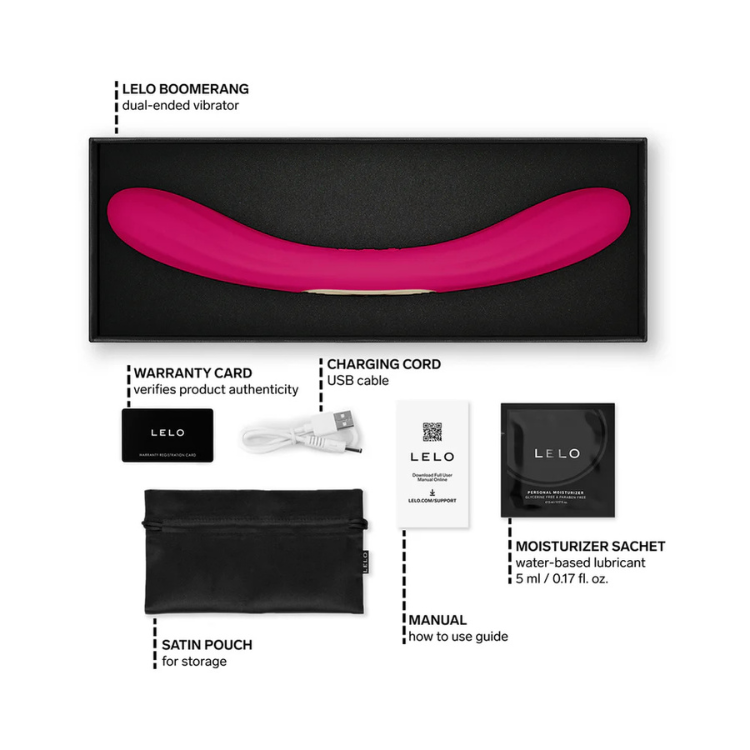 Pink dual-ended vibrator set with charging cable, warranty card, pouch, manual, and lubricant sachet.