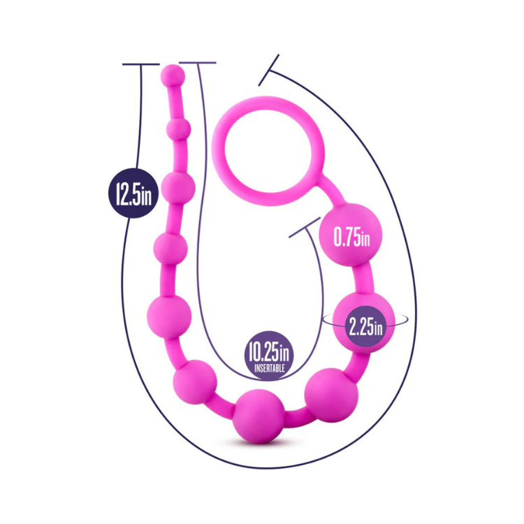 Pink silicone bead strand with pull ring and size measurements for intimate wellness use