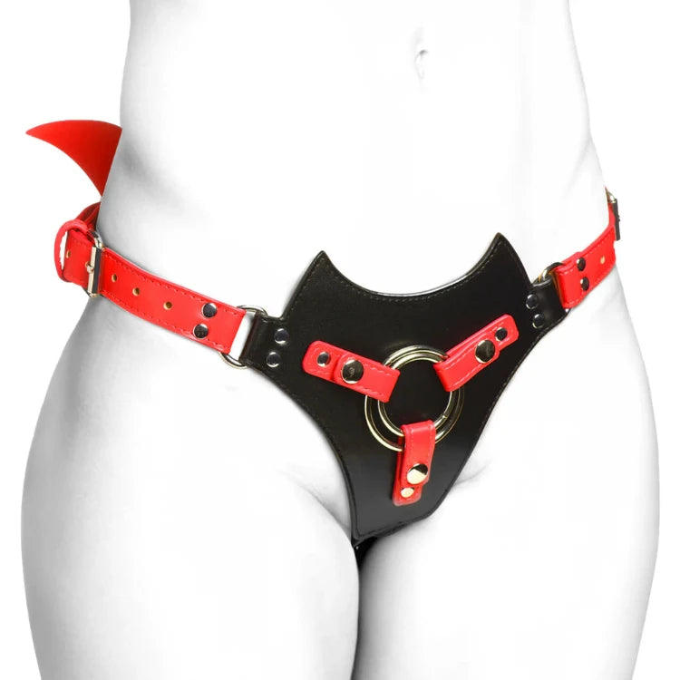 Red and black leather harness with devil horns and metal ring, worn as adult lingerie