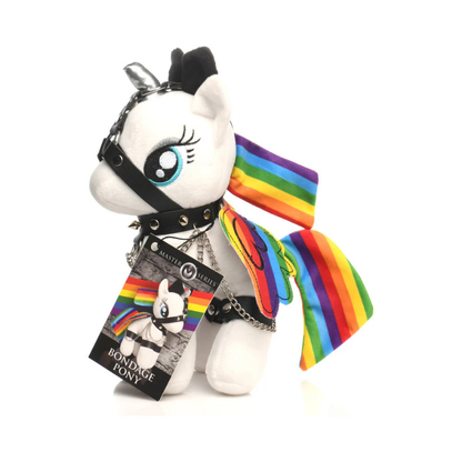Plush unicorn pony toy with rainbow mane, metallic horn, and decorative harness chains