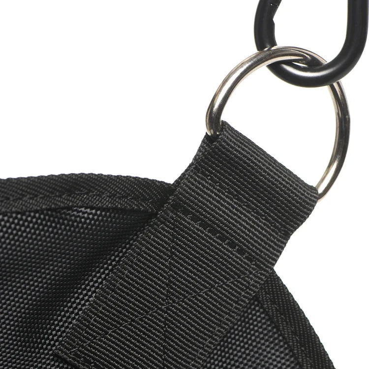 Close-up of the black nylon strap and metal ring attachment on a Masters Series sex sling.