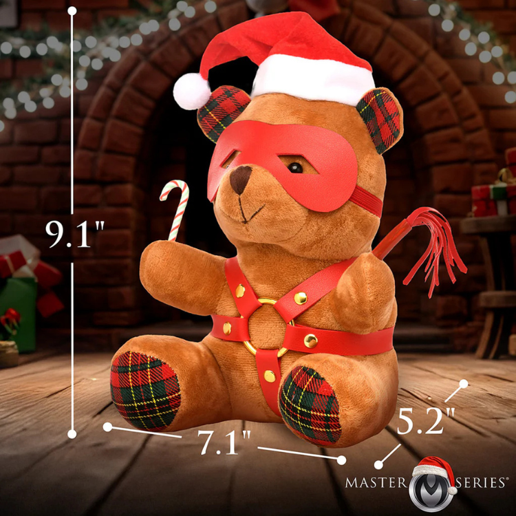 Master Series Brown Bondage bear in red harness and Santa hat with holiday decor, plaid accents, measurements shown