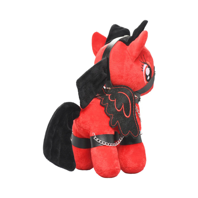 Red plush pony with black harness, wings, and chain accents, side view on white