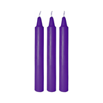 Three purple drip candles standing upright on a plain white background.