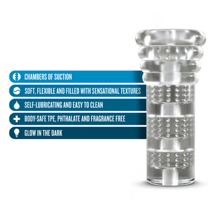 Clear textured glow-in-the-dark male stroker with suction chambers and raised dots.