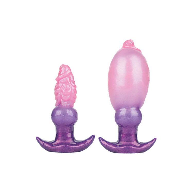 Two pink and purple inflatable silicone anal plugs with fantasy shape shifter design