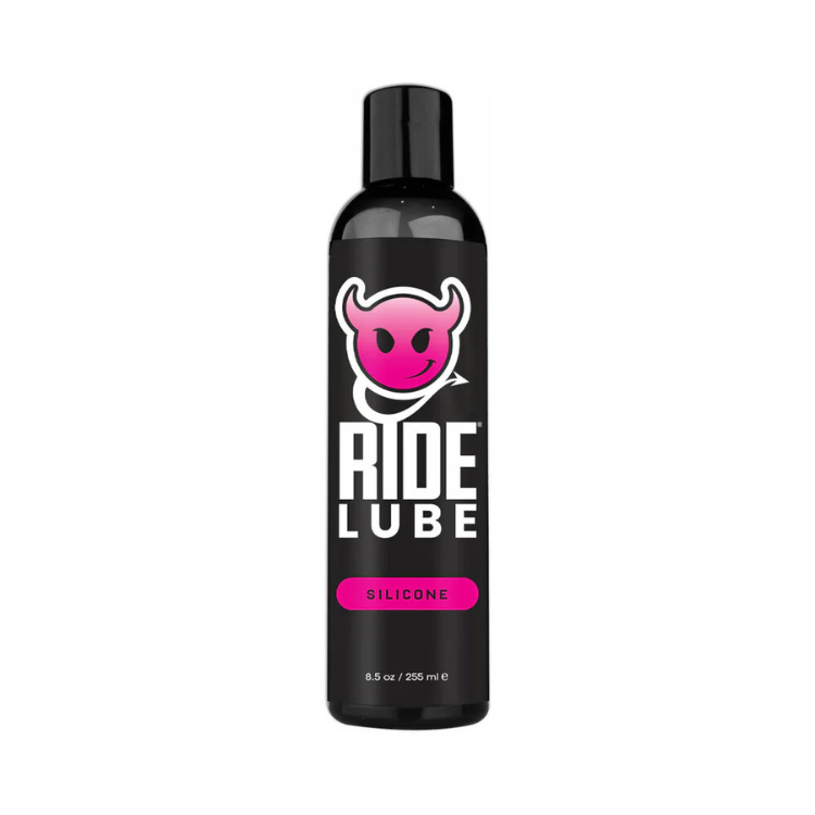 Black bottle of Ride Lube silicone personal lubricant, 8.5 oz, with pink devil logo