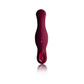 Rose-colored saddle-shaped personal massager with ergonomic handle on white background