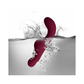 Waterproof burgundy saddle vibrator splashing in water, ergonomic adult toy