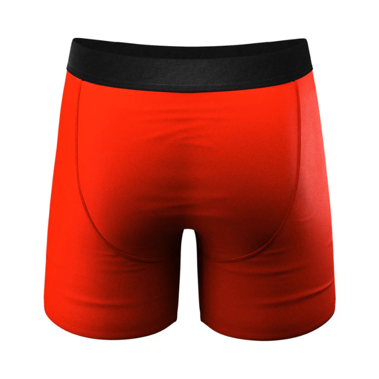 Back view of bright red men's boxer briefs with black waistband