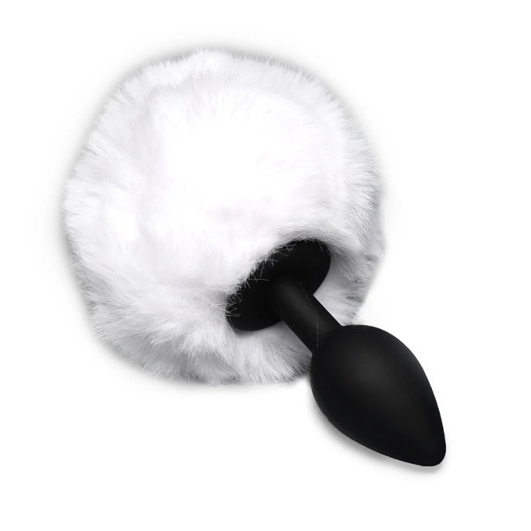 black silicone plug with fluffy white faux fur bunny tail on white background
