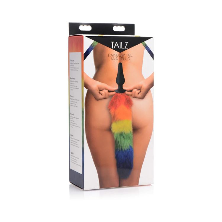 Box for silicone butt plug with rainbow faux fur tail, adult novelty product.