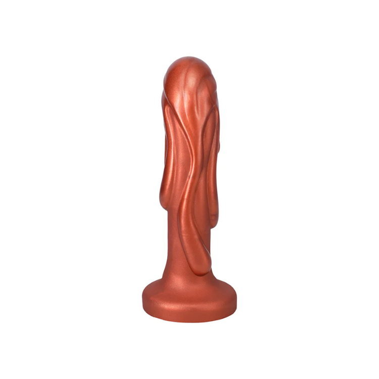 Copper fantasy silicone dildo with textured swirls and flared base on white background
