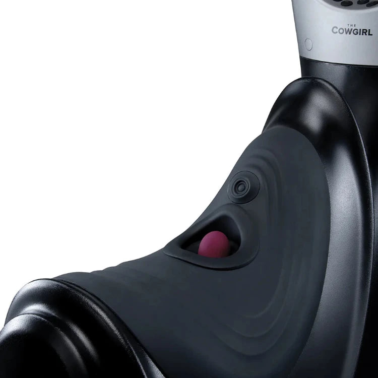 The Cowgirl luxury sex toy with ergonomic black design and pink accent, featuring intuitive controls for intimate pleasure.