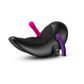 Black saddle-style adult toy machine with pink and purple silicone attachments on white background
