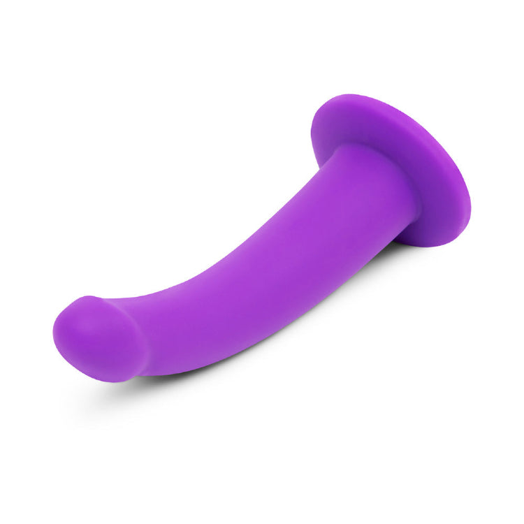 Curved purple silicone pleasure toy with a flared base on a white background