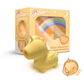 Yellow unicorn-shaped vibrator with packaging featuring rainbow and fantasy design elements.