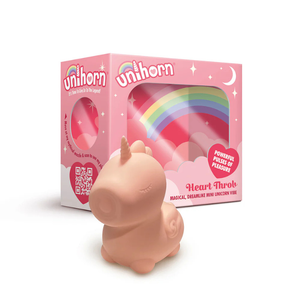 Pink unicorn-shaped mini vibrator with colorful rainbow packaging and playful design.