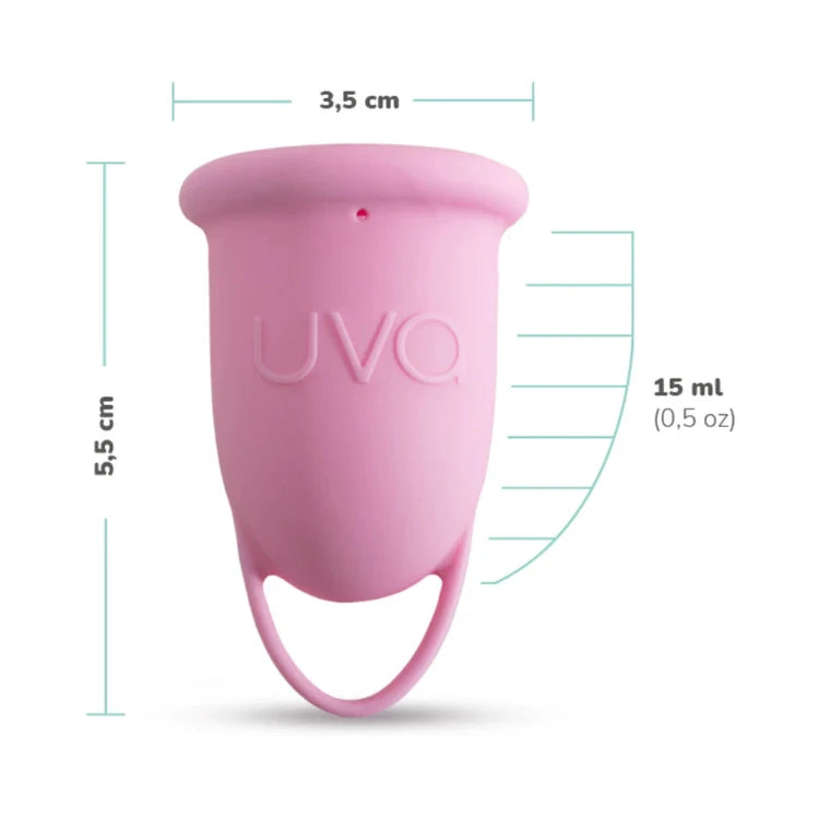 Pink menstrual cup with finger loop, 5.5 cm tall, 3.5 cm wide, 15 ml capacity, UVQ label visible.