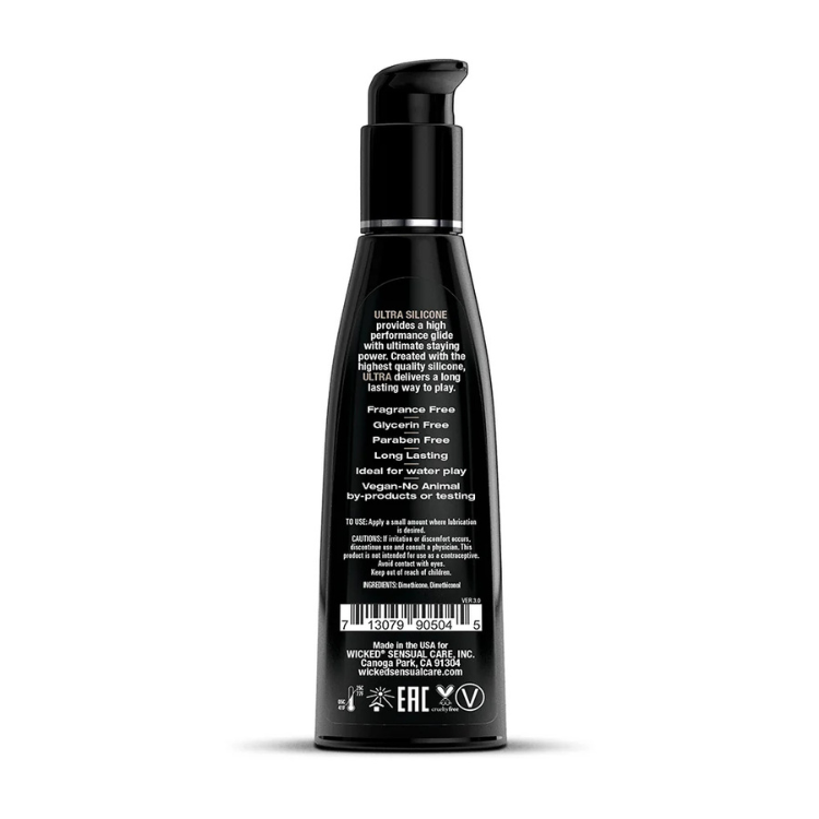 Back of a black silicone lubricant bottle with ingredient and usage details visible.