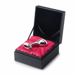 Stainless steel plug displayed on red satin in a black gift box